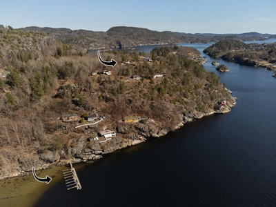 Sommerhytte med panorama utsikt over sjøen med egen båtplass - kort vei fra E18 - usjenert med fine rekreasjonsområder