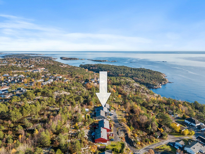 Rekkehus med fantastisk havutsikt i veletablert boligområde - Flotte uteområder med gode solforhold - Garasje